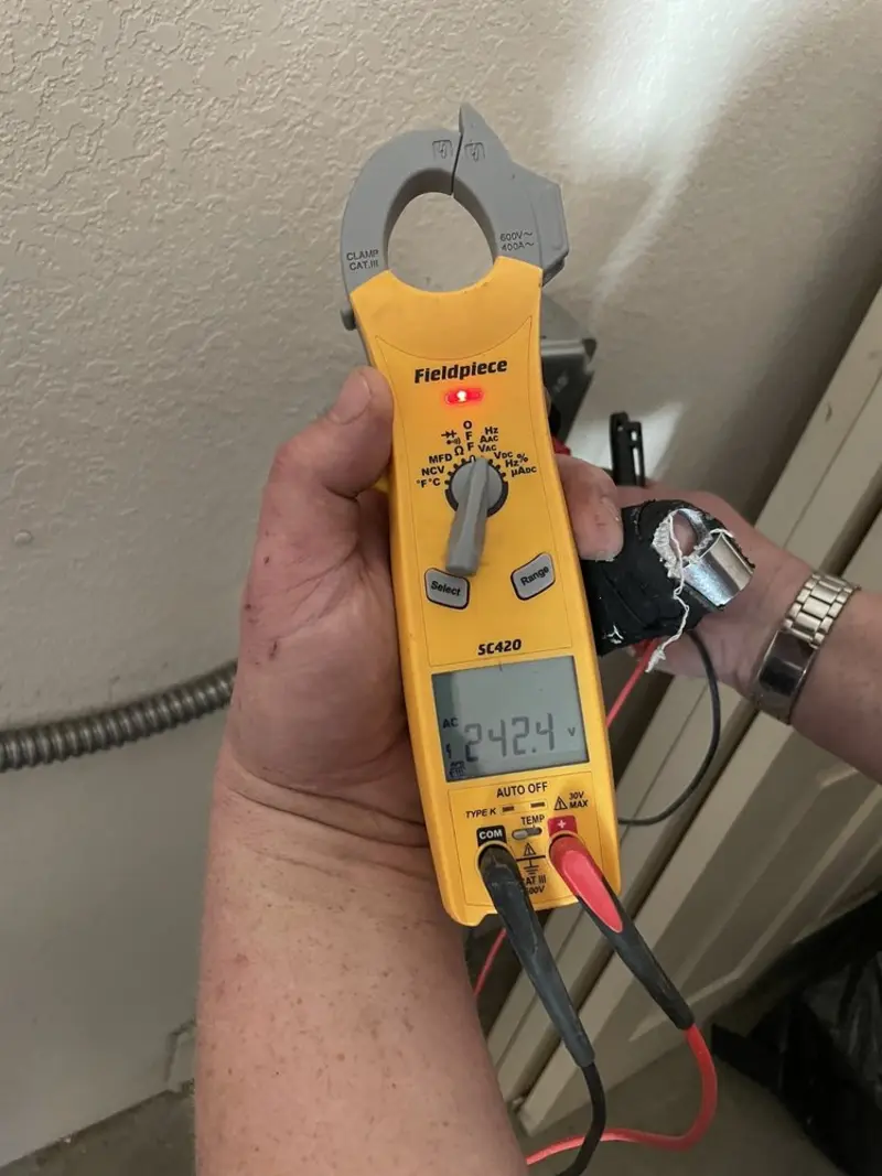 Voltage testing with clamp meter during Aluminum Wiring Replacement in Hastings